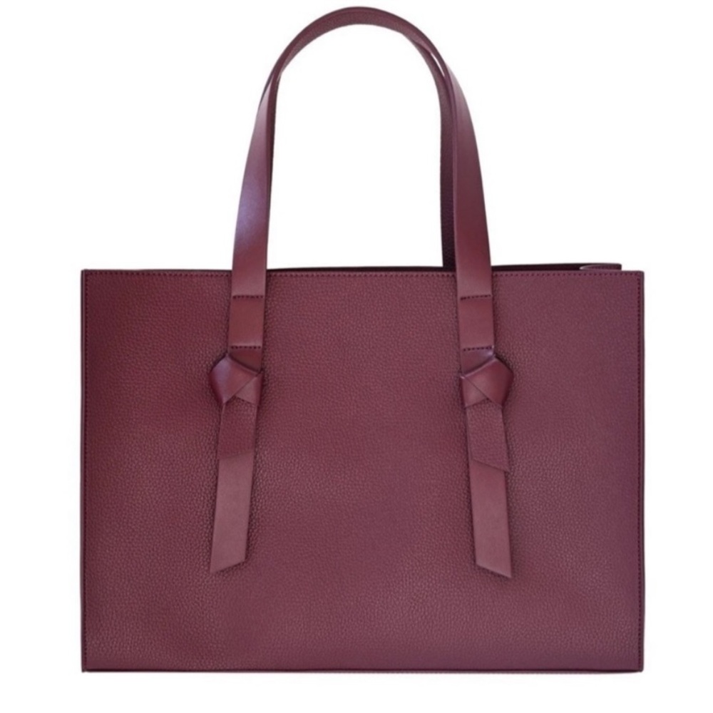 Burgundy tote bag.
